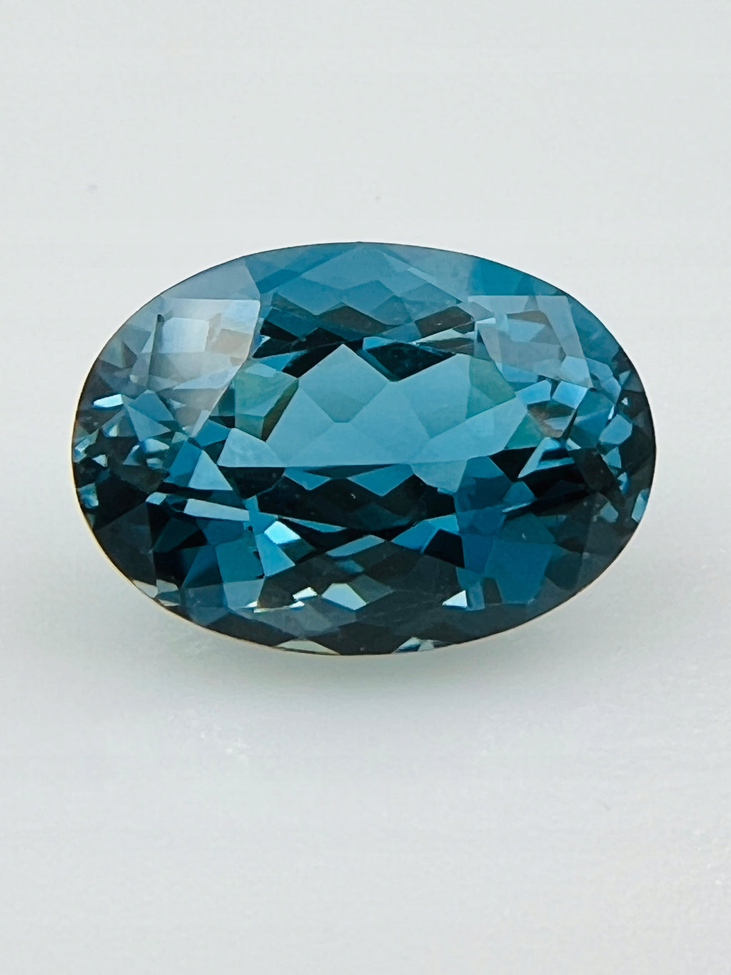 TOPAZ LONDON NATURALNY OWAL 14x10 mm