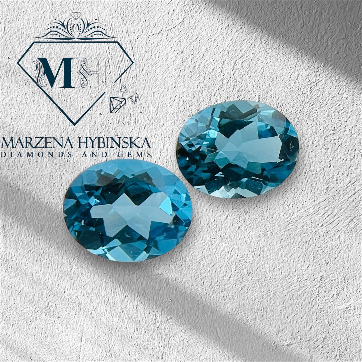 TOPAZ SWISS BLUE OWAL 10x8 MM