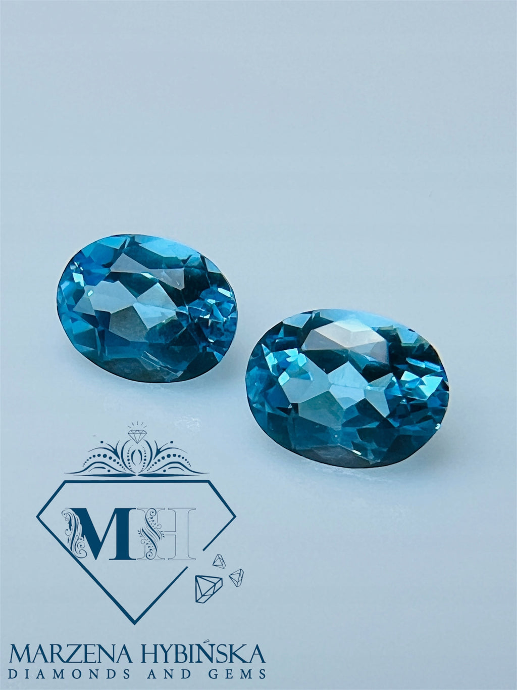 TOPAZ SWISS BLUE OWAL 9X7 MM