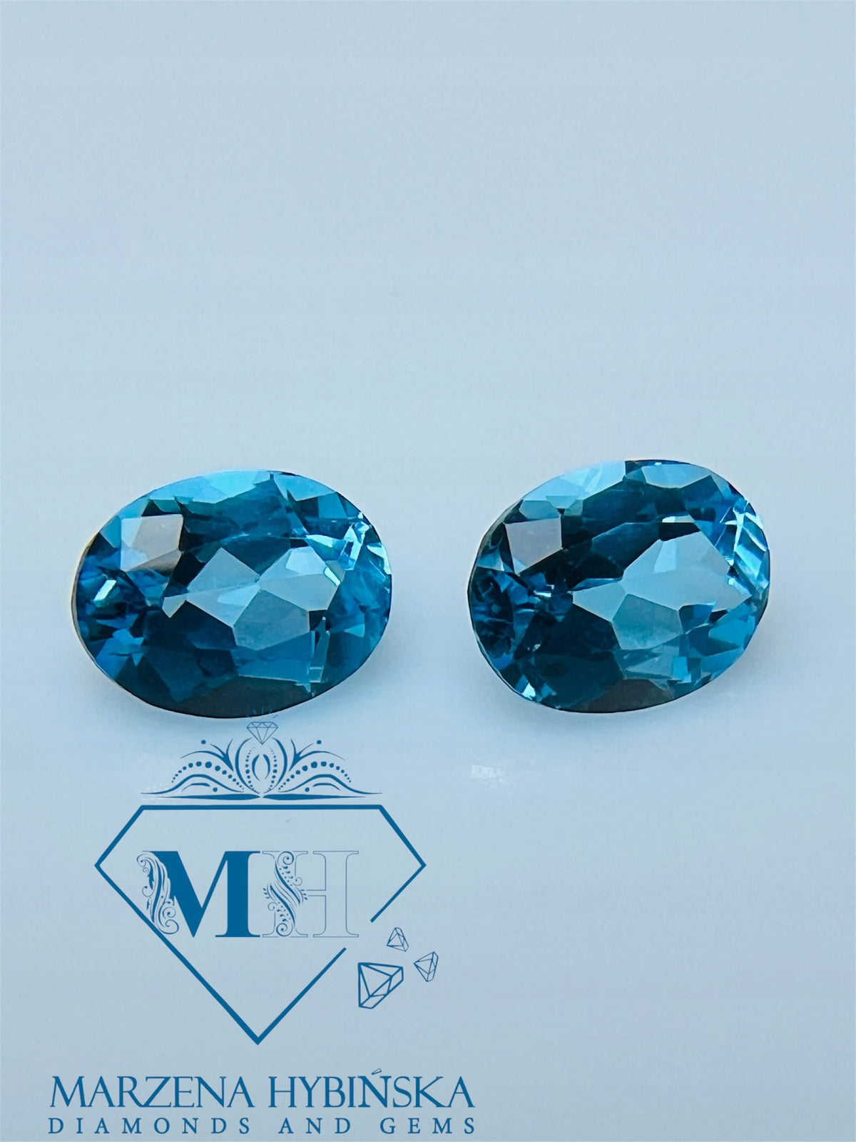 TOPAZ SWISS BLUE OWAL 9X7 MM