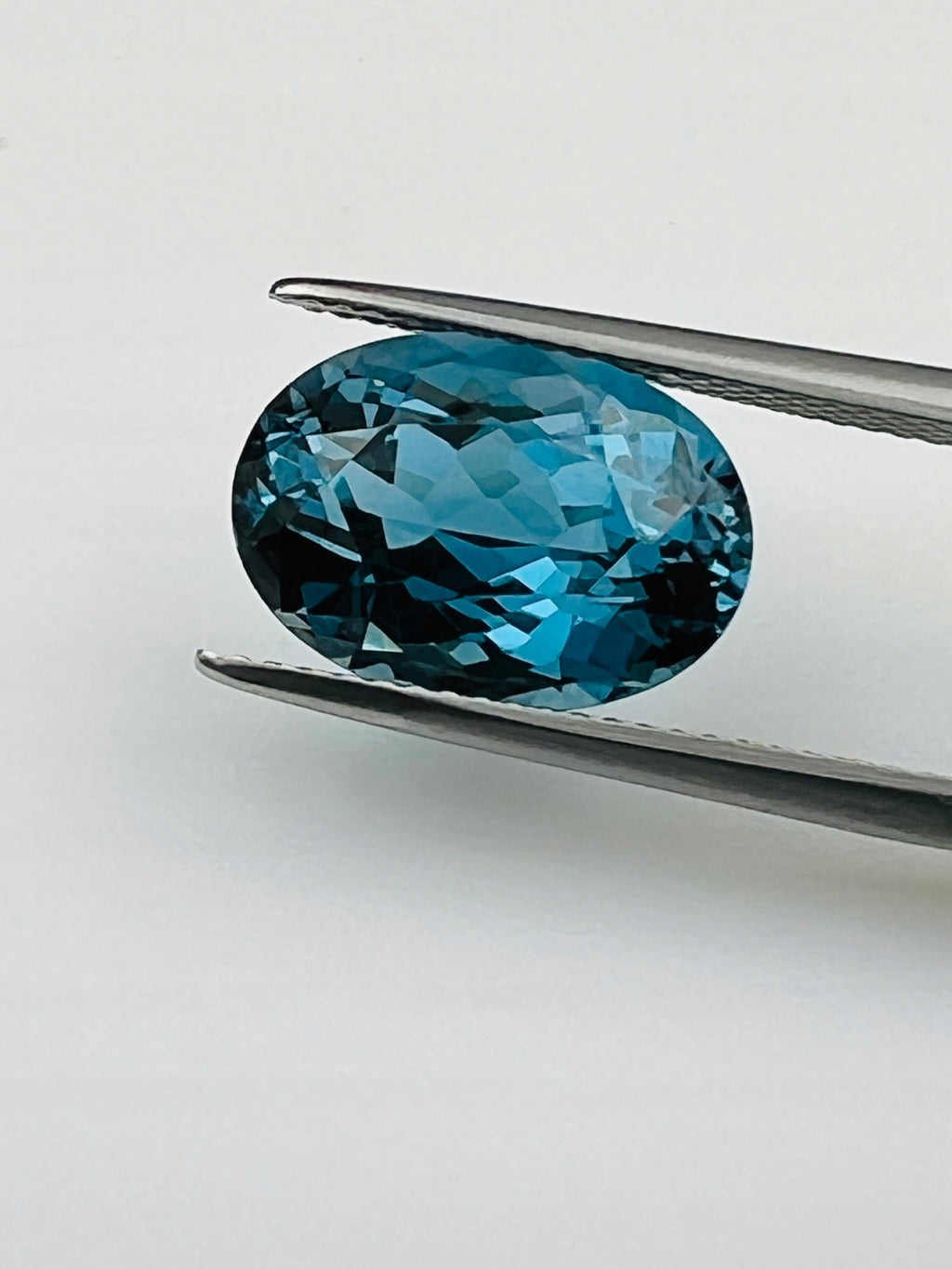 TOPAZ LONDON NATURALNY OWAL 14x10 mm