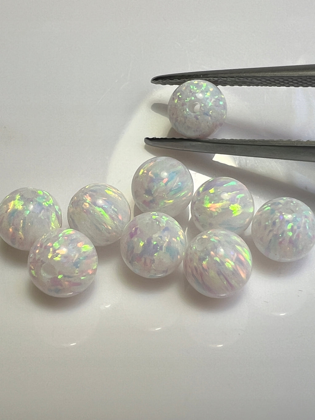 OPAL BIAŁY ARLEKIN KULA 4 mm NAWIERCONA