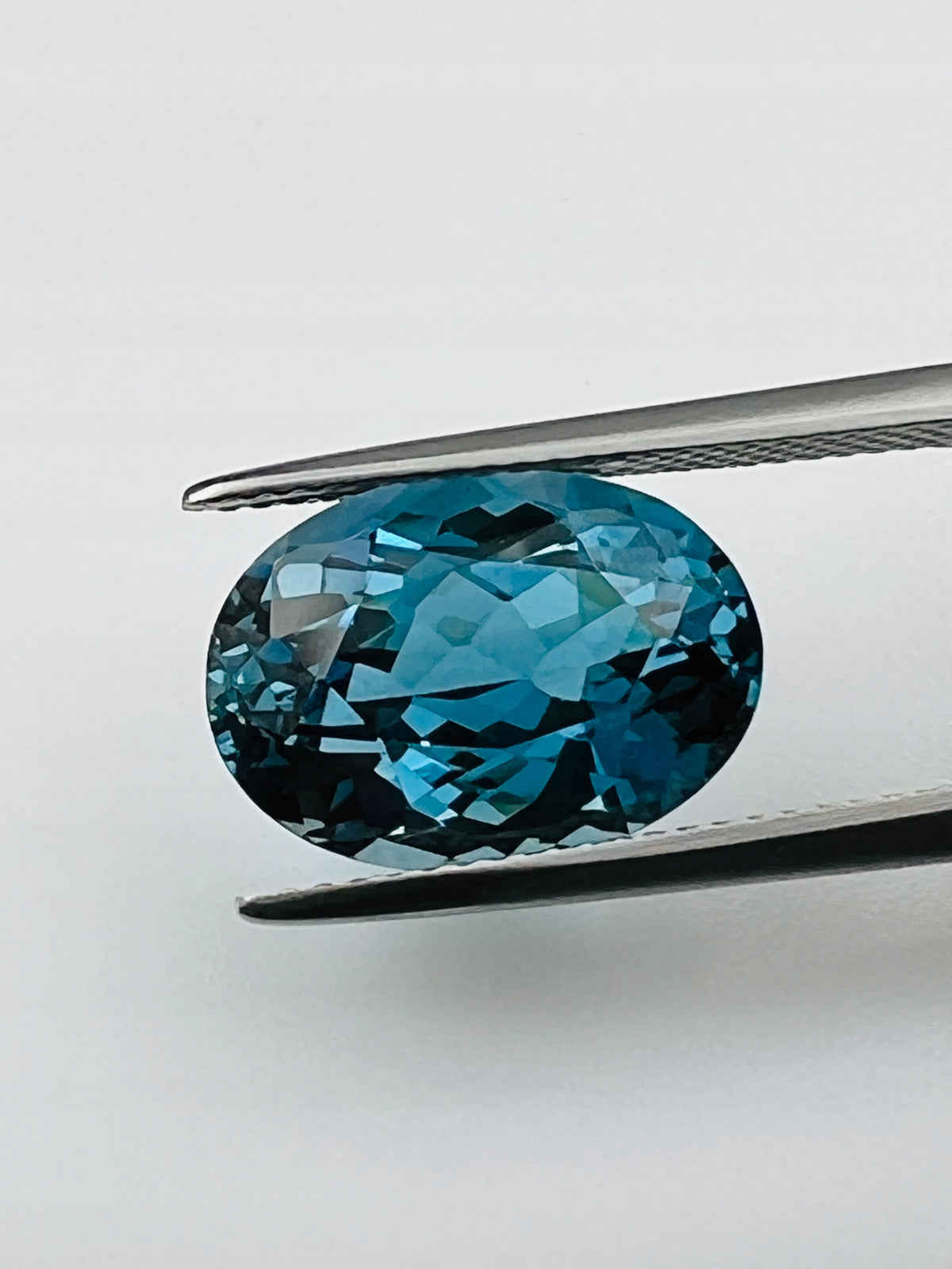 TOPAZ LONDON NATURALNY OWAL 14x10 mm