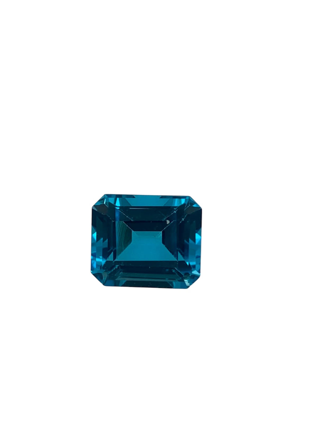 TOPAZ SWISS BLUE OŚMIOKĄT 12X10 mm