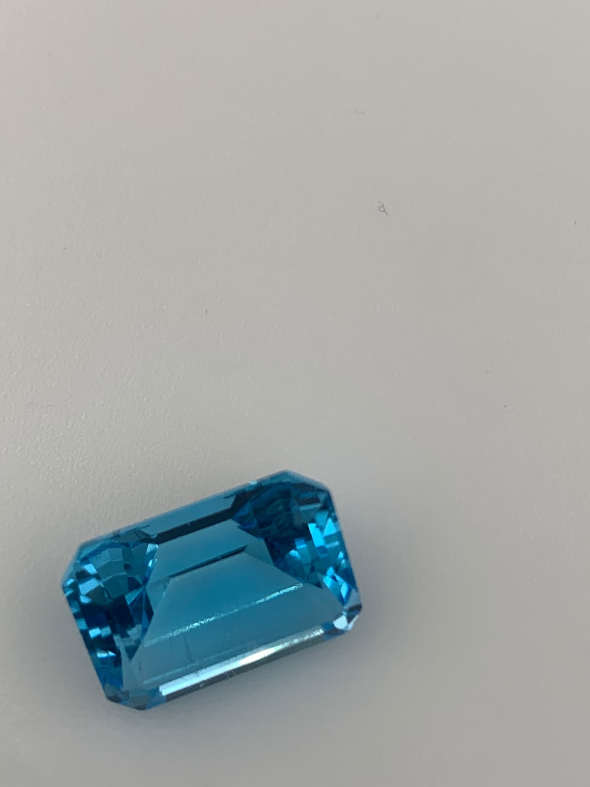 TOPAZ SWISS BLUE OŚMIOKĄT 14X10 mm