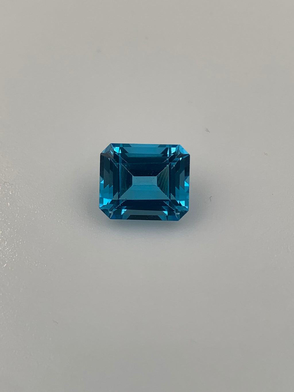 TOPAZ SWISS BLUE OŚMIOKĄT 12X10 mm