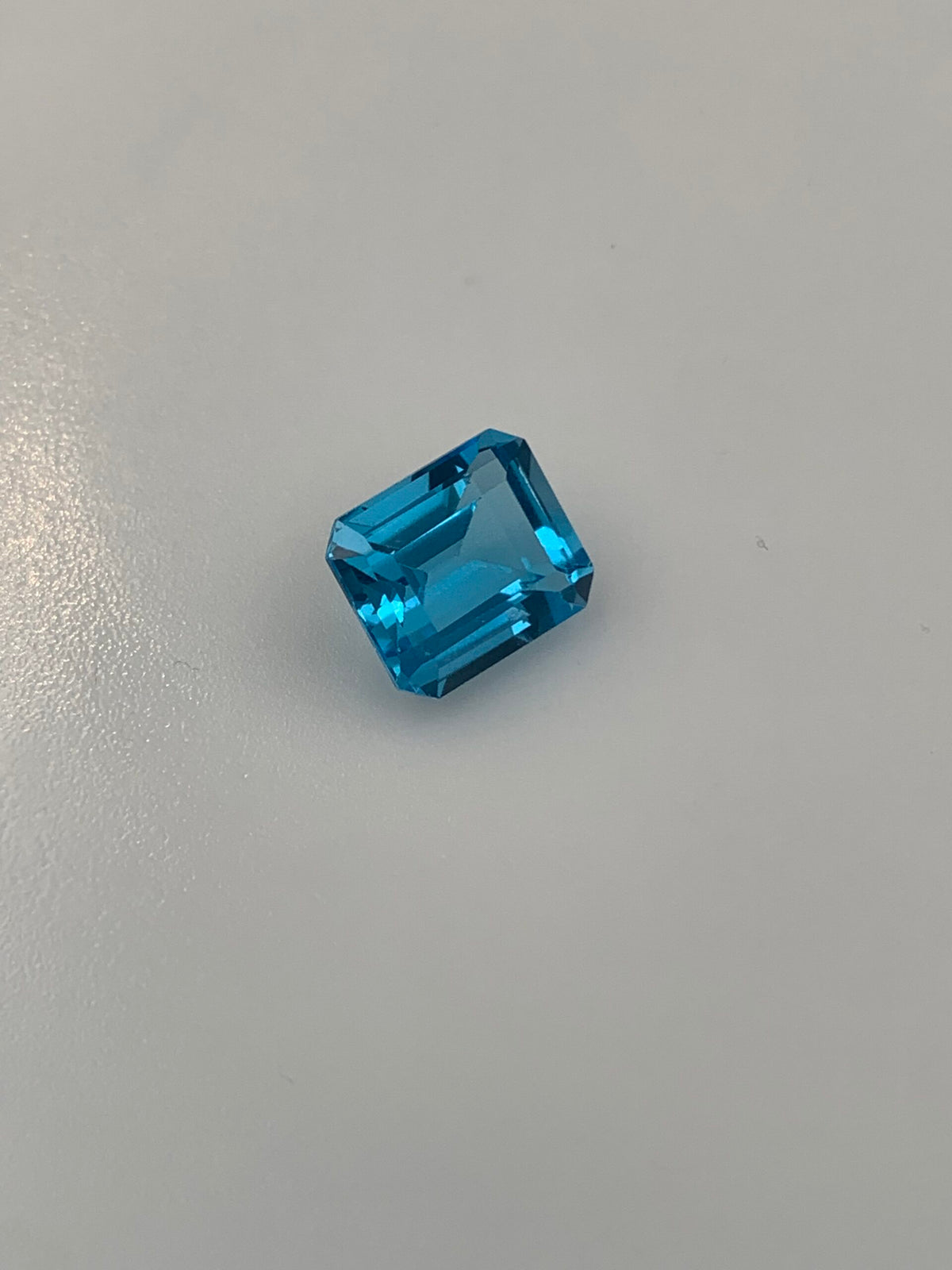 TOPAZ SWISS BLUE OŚMIOKĄT 12X10 mm