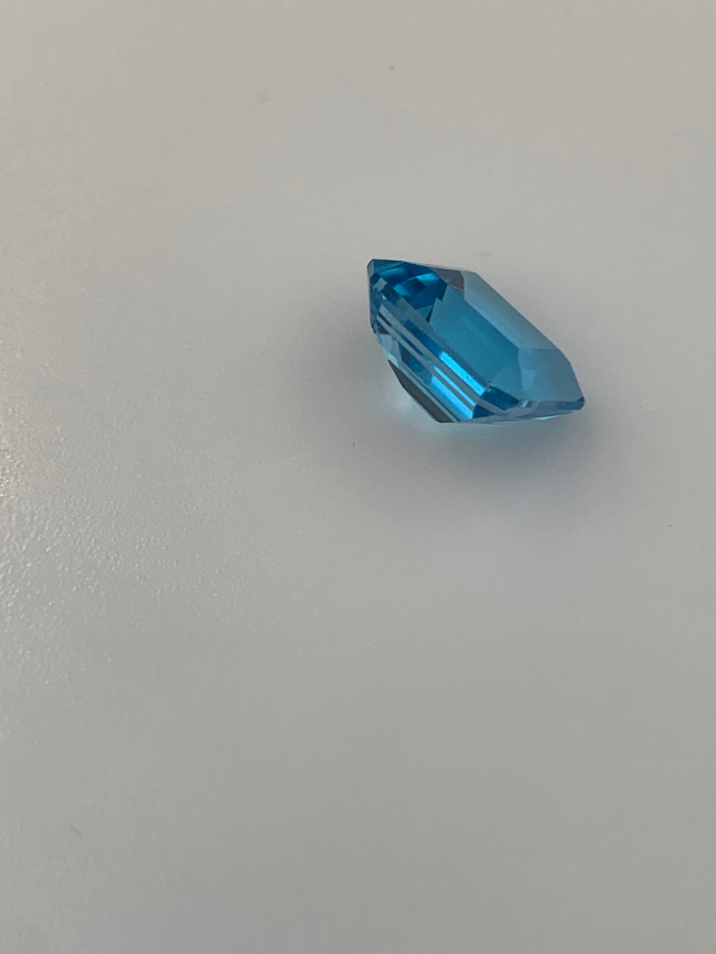 TOPAZ SWISS BLUE OŚMIOKĄT 12X10 mm