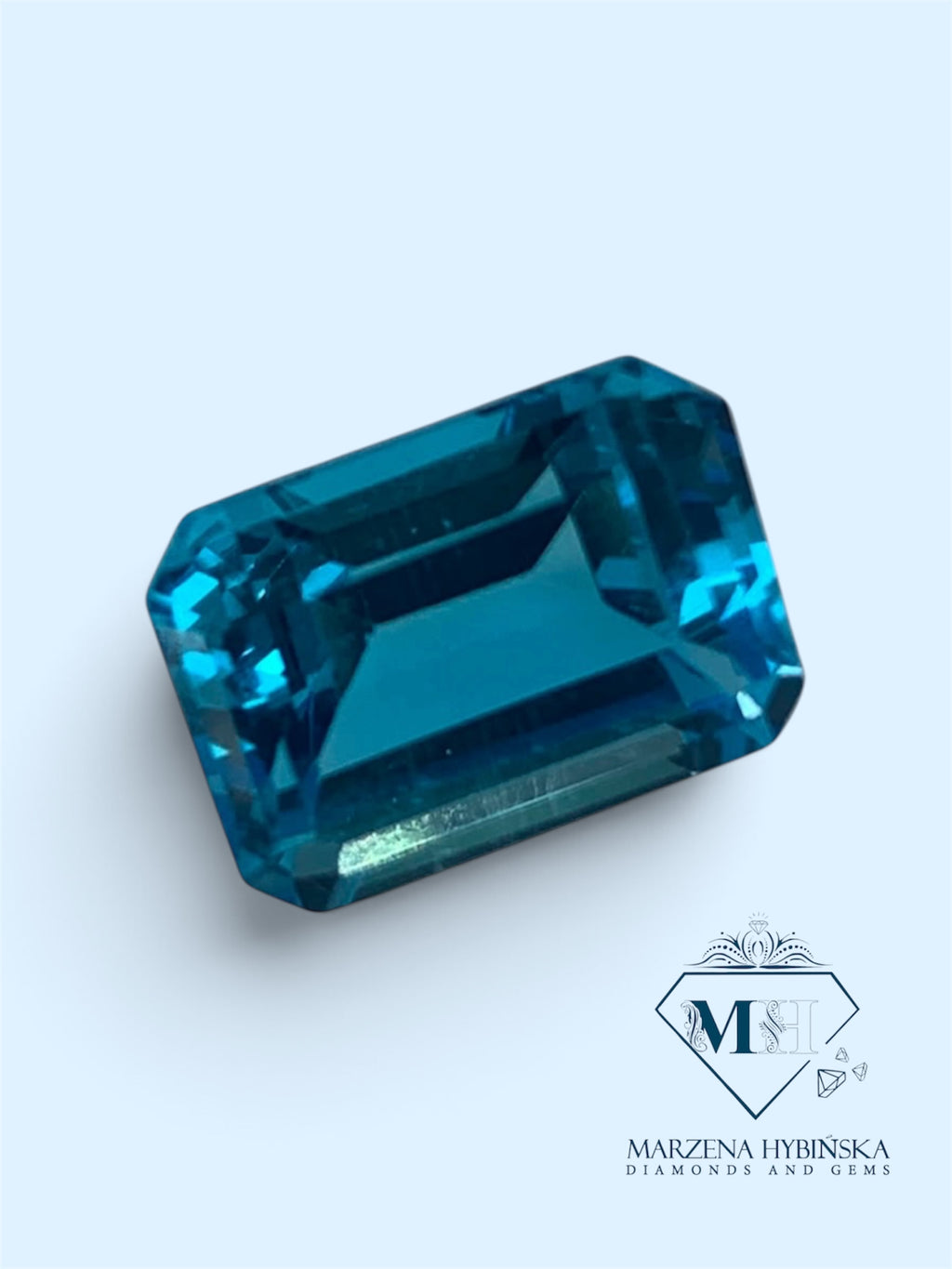TOPAZ SWISS BLUE OŚMIOKĄT 14X10 mm