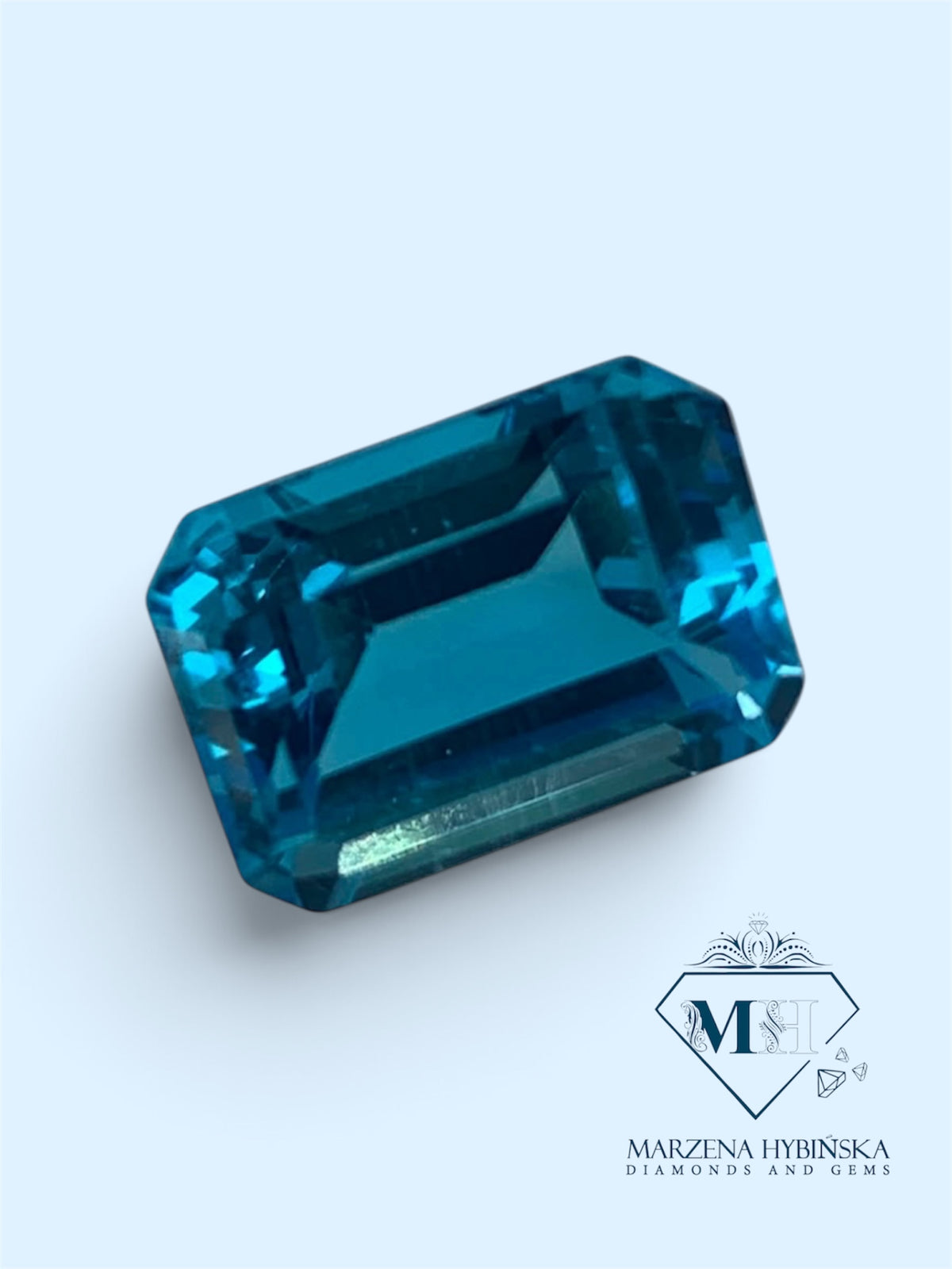 TOPAZ SWISS BLUE OŚMIOKĄT 14X10 mm