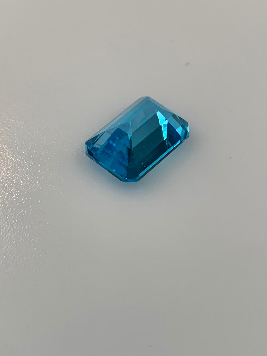 TOPAZ SWISS BLUE OŚMIOKĄT 14X10 mm