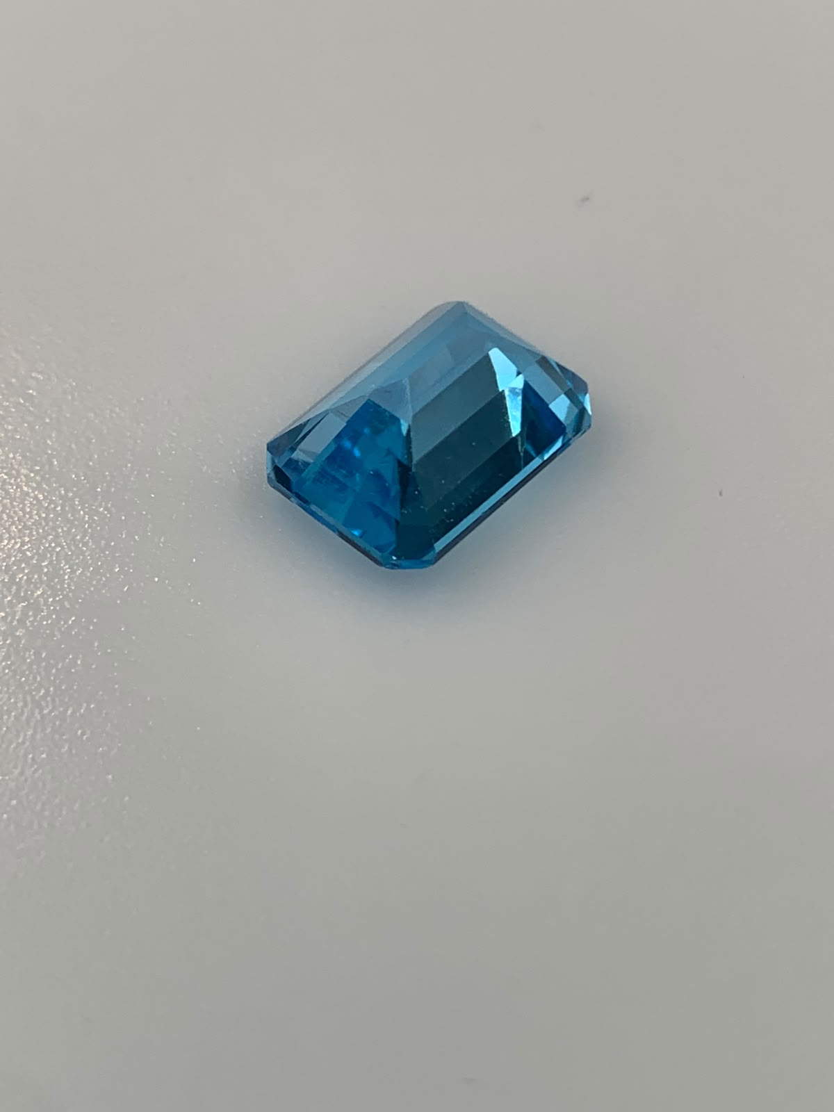 TOPAZ SWISS BLUE OŚMIOKĄT 14X10 mm