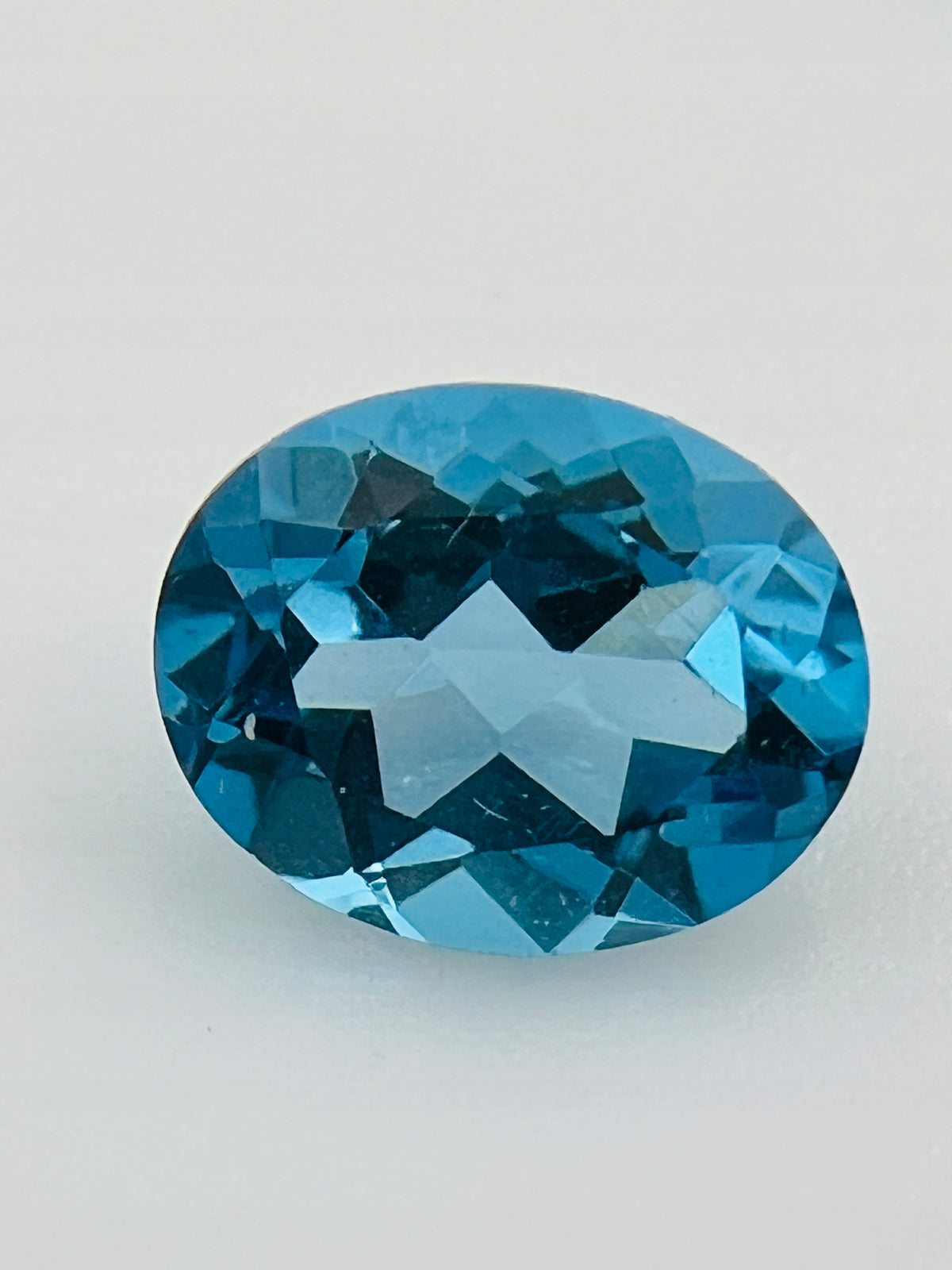 TOPAZ SWISS BLUE OWAL 10x8 MM