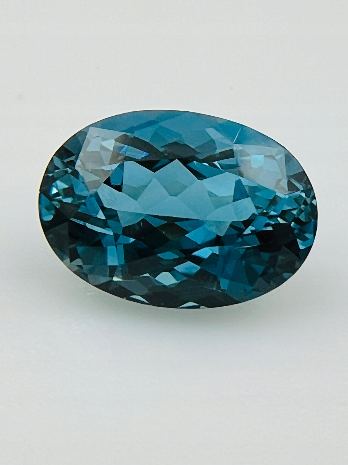 TOPAZ LONDON NATURALNY OWAL 14x10 mm